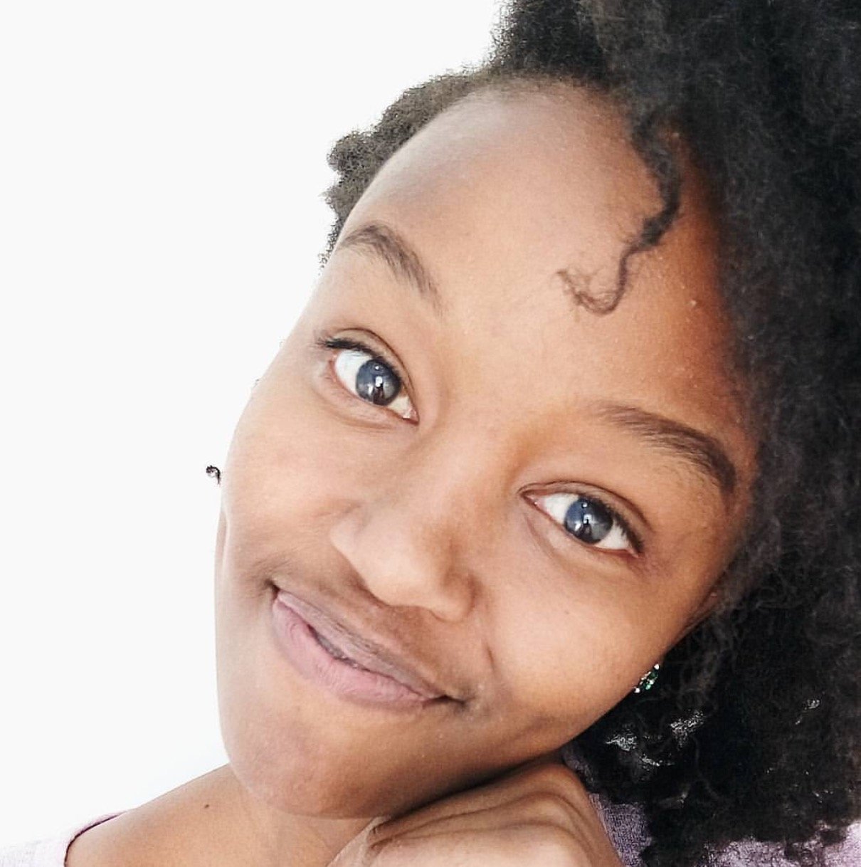 Maureen Kunga's make up free face