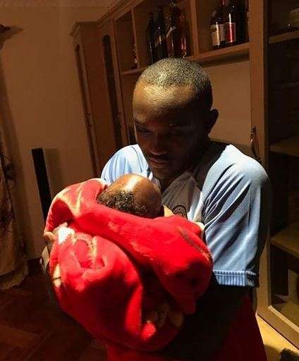 Benson Gatu bonding with his daughter
