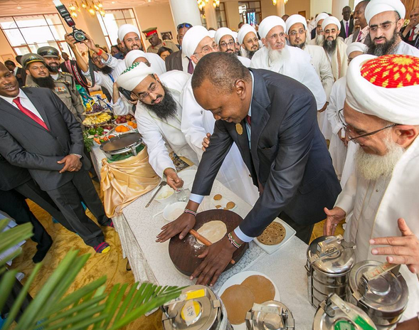 President Uhuru making chapati