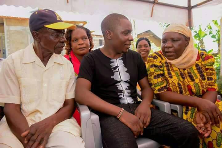 Samuel Abasai in Kakamega with his parents