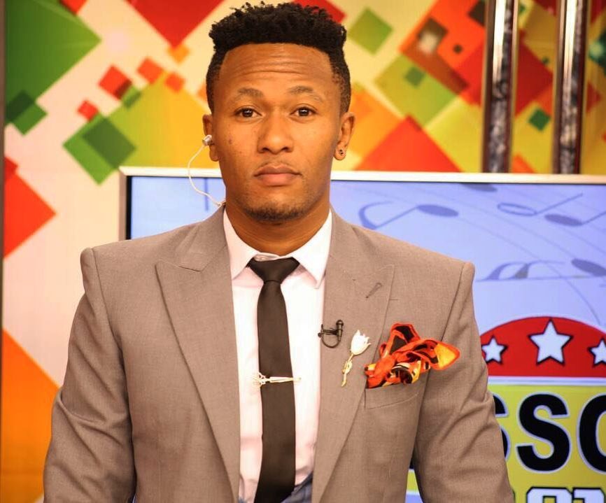 Dapper man! Six amazing photos of DJ Mo rocking his suit and tie
