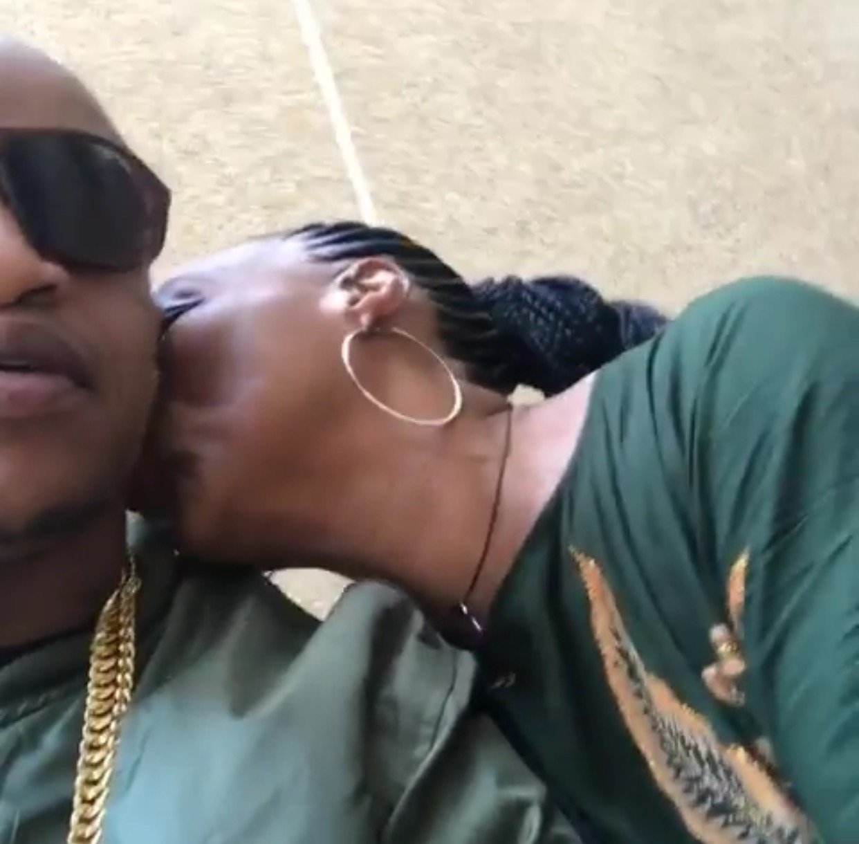 Prezzo's mum shows off her rapping skills before planting a kiss on her son (Video)