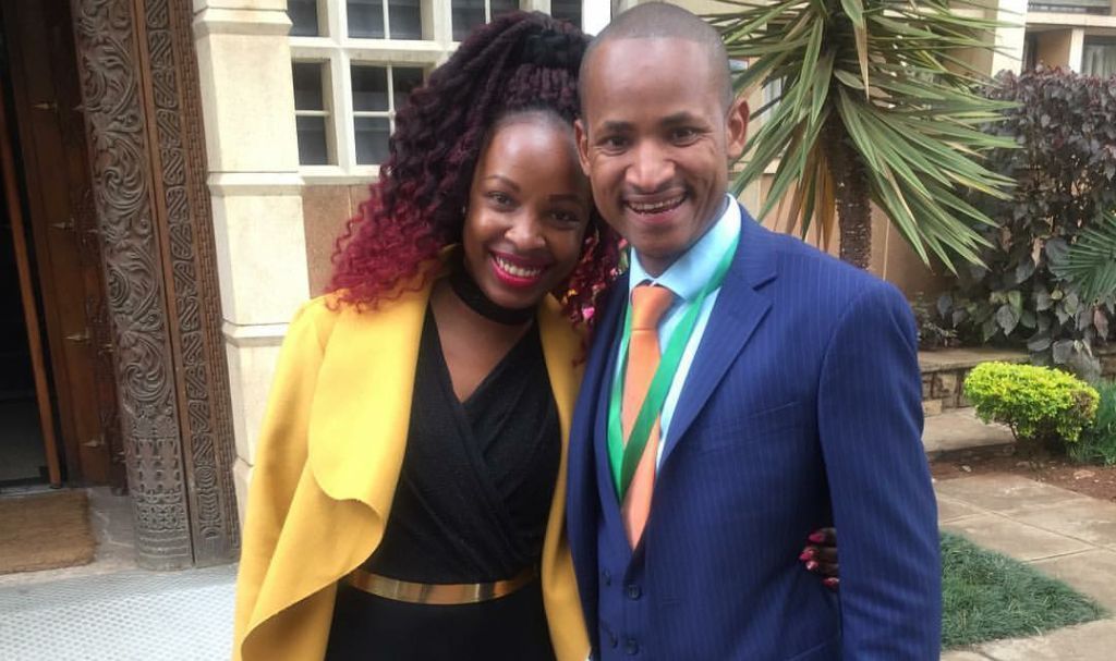 Babu Owino’s wife slays in a black jumpsuit as she escorts her husband to be sworn in at parliament (Photos)