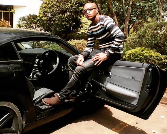 Bad parenting! Prezzo criticized after sharing a video of his 8 year old son driving (Video)
