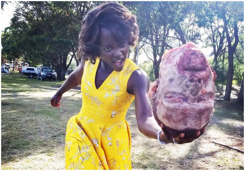 Lupita Nyong’o strikes terror into netizens as she plays with human head that had been chopped off from the body