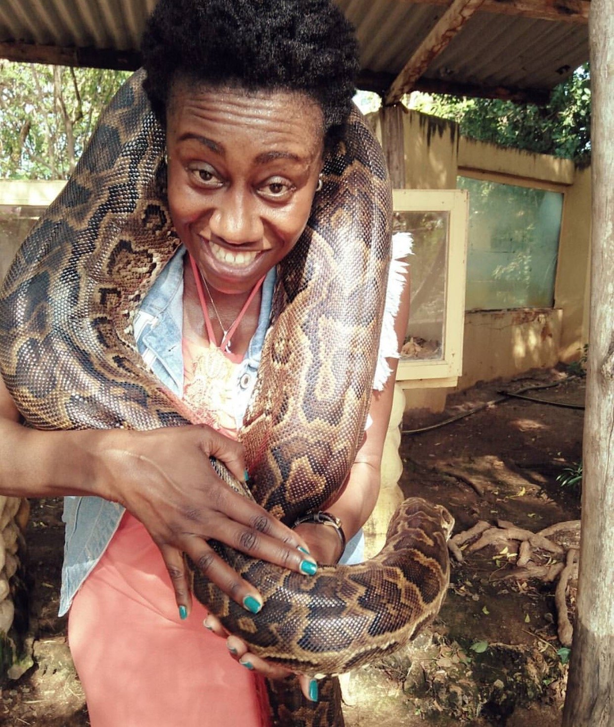 Papa Shirandula’s wife photographed carrying a huge snake, leaves fans talking!