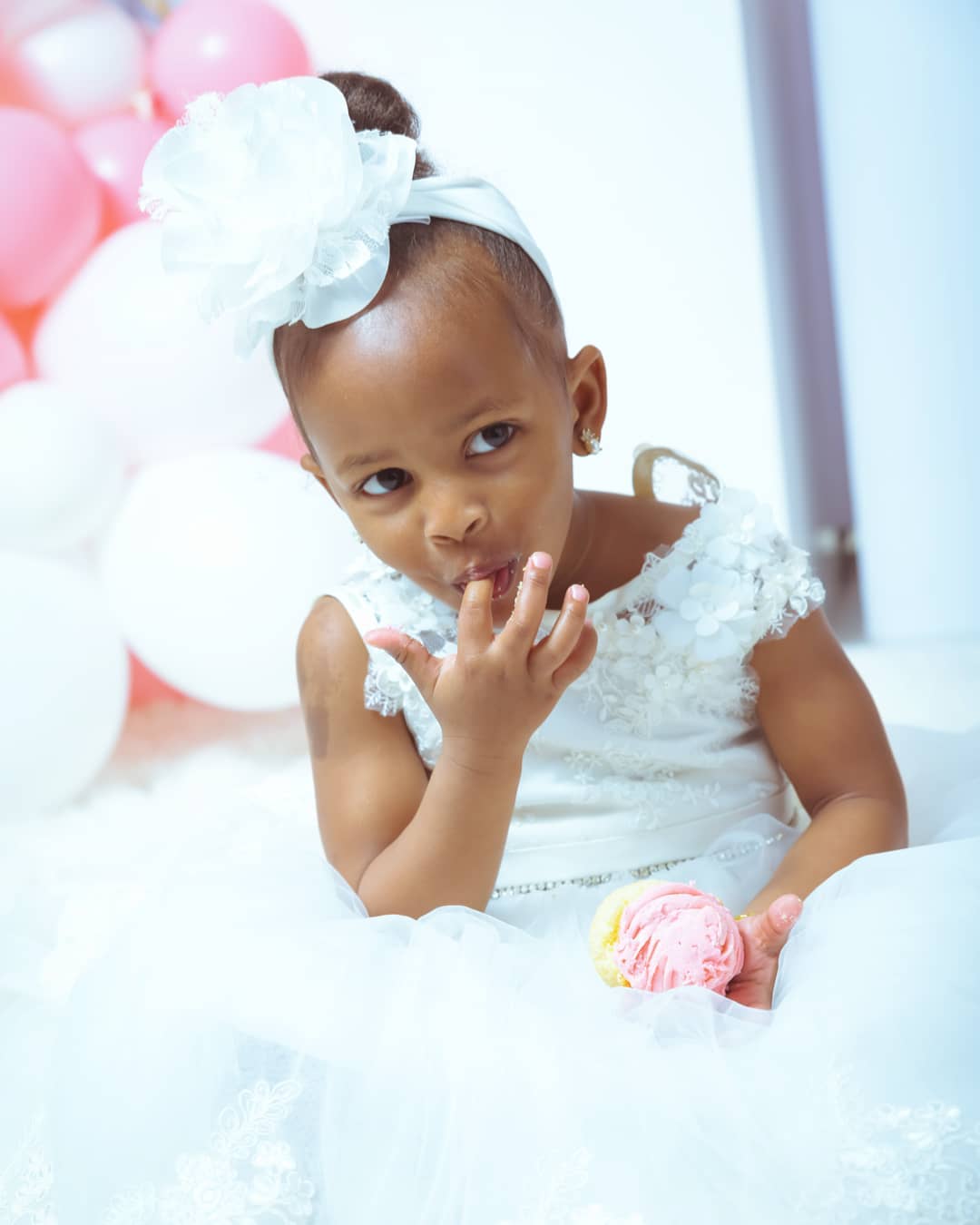 Princess Tiffah poses for a photo during her 3rd birthday party celebration 
