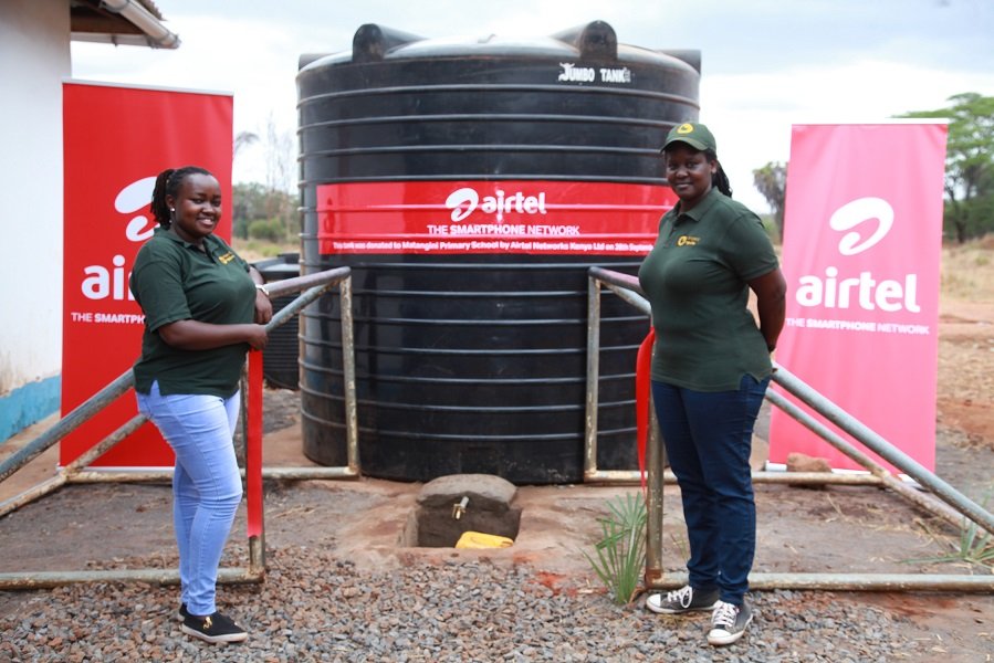 From left, Dorcas Gathura and Angela Kabari of Project Ngulia who are running the Community Conservation Awareness project in partnership with Airtel and KWS.