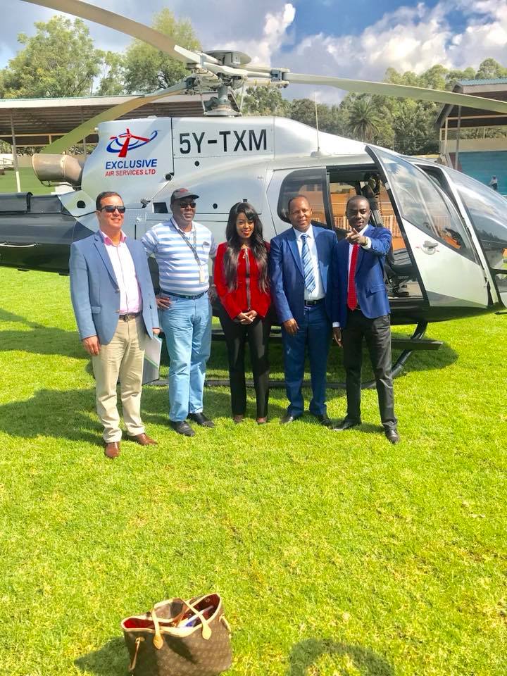 Lillian Muli with her baby daddy Jared Nevaton (second on right) pose for a photo after they touched down in Kisii