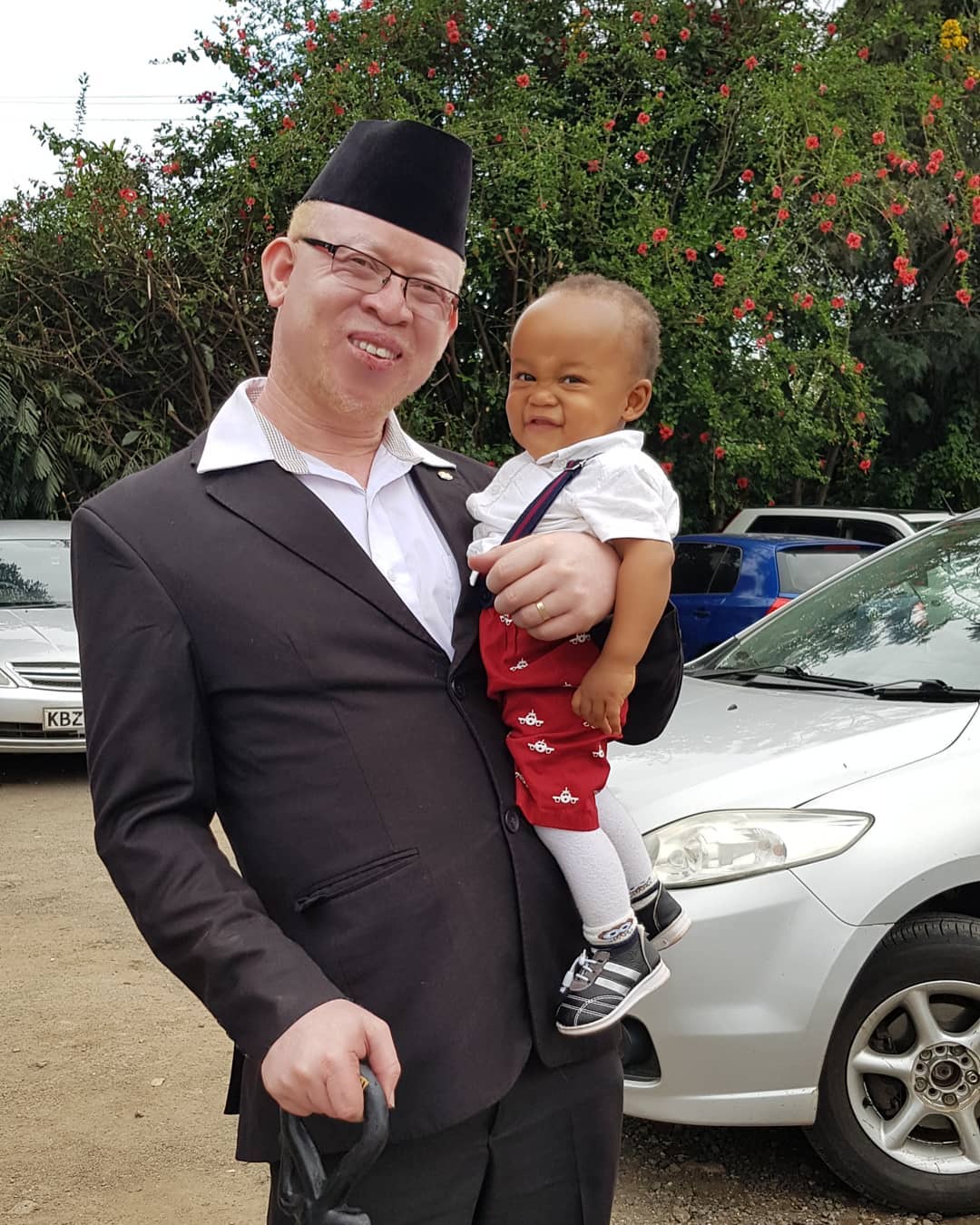 Isaac Mwaura with his son