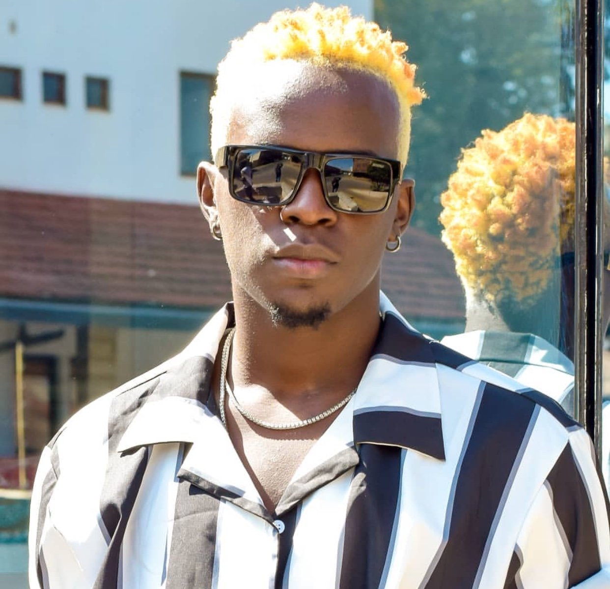 You look like a fire emoji!” Willy Pozee criticized after shaving his natty  dreadlocks for this new hair do - Ghafla! Kenya