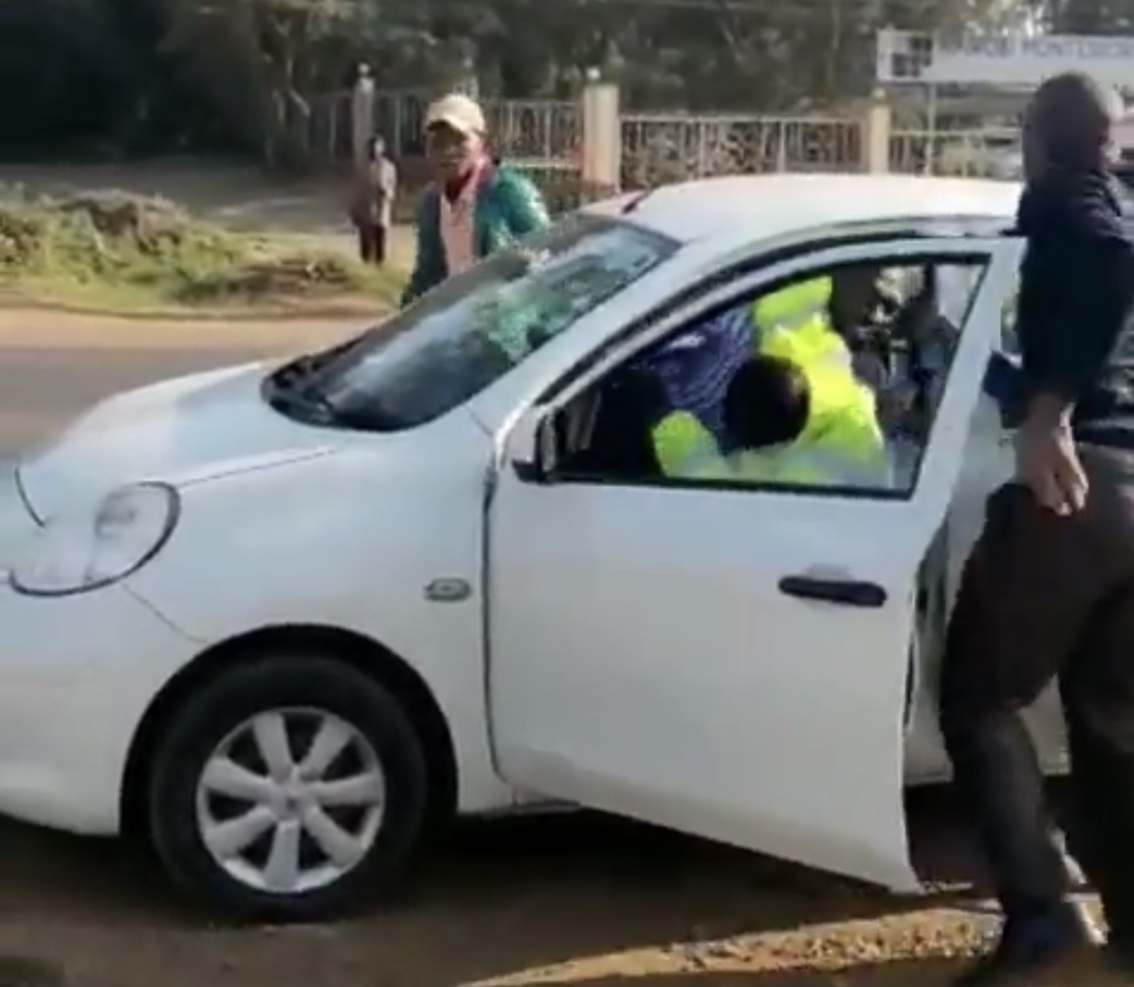 Taxi driver filmed beating up a cop is finally arrested