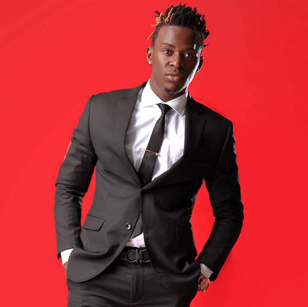 Janet Mbugua serves Willy Paul a hard tackle