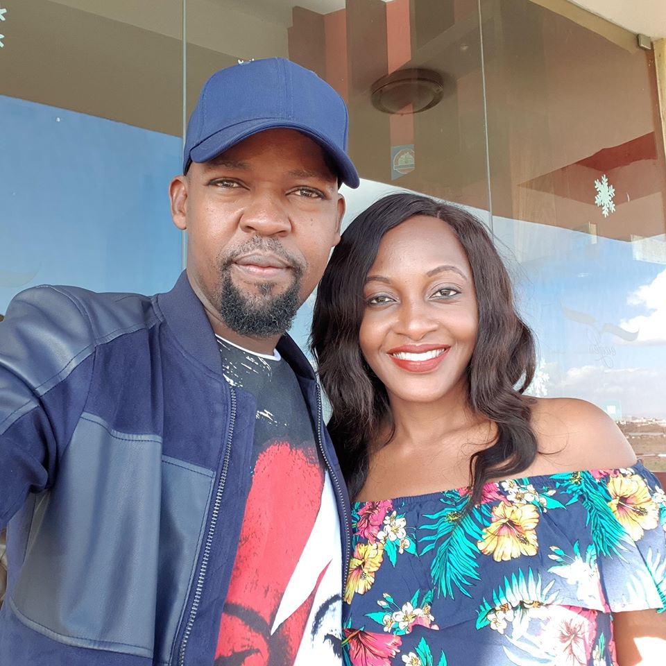 Alex Mwakideu with his wife