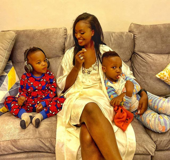 Maureen Waititu with her children by Frankie Just Gym It