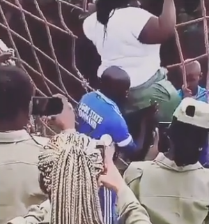 Hilarious! Lagos Corps Members Butt-lift Colleague Up Ladder
