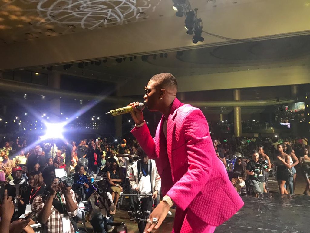 See photos of Wizkid as he stuns in pink at his concert
