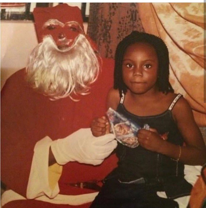 Teniola Shares Childhoot Photo of herself and Weird Santa