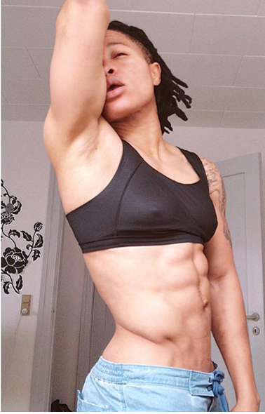 Female footballer Chichi Igbo flaunts her six-packs in this photo