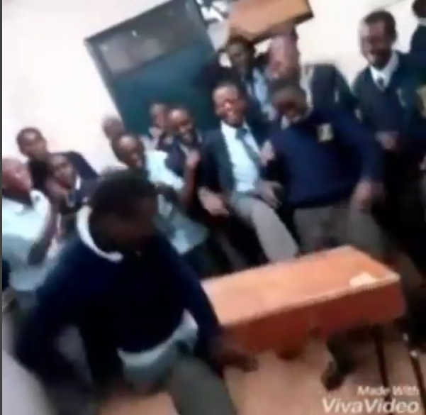 This Viral Video of Highschool boys daggering a desk might just explain why they performed terribly in KCSE